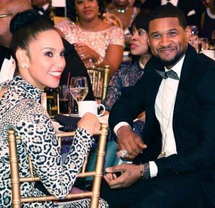 Naviyd Ely Raymond's father, Usher, with his stepmother, Grace.